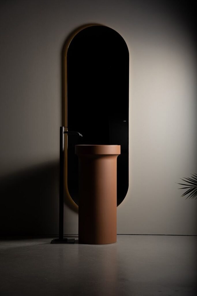 “Stylish pedestal modern wash basin in a spacious bathroom with soft ambient lighting and high-end sanitaryware.”