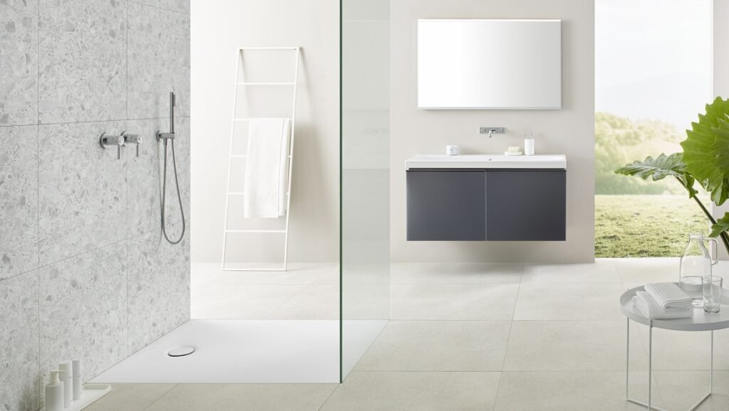 Open walk-in shower and wall-mounted fixtures showing sanitaryware trends 2025 in Gurugram