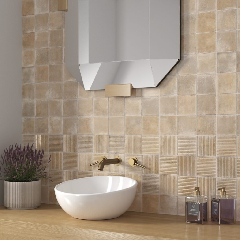 Minimalist office washroom backsplash featuring beige textured designer tiles for office vanity spaces with brushed gold fittings