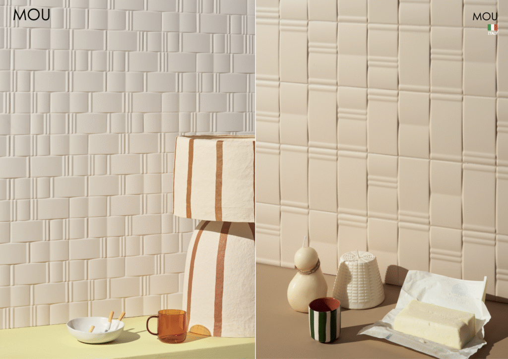 Close-up of cream customised tiles with unique textured patterns, styled with decorative accessories.