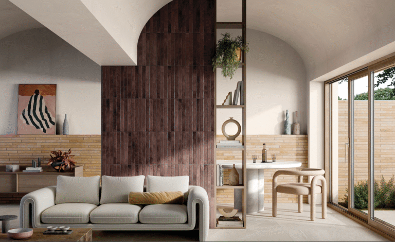 Elegant living room with dark brown customised tiles feature wall, modern sofa, and artistic interior décor.