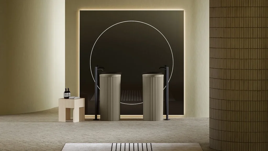 Designer pedestal washbasins and luxury tiles and sanitaryware in Gurgaon with ambient lighting and modern interiors.