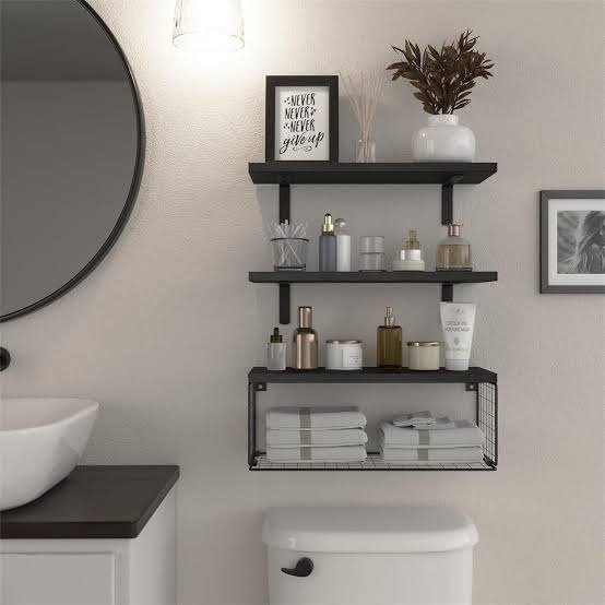 Small bathroom redesign ideas featuring smart storage solutions like floating shelves, recessed niches, and mirror cabinets to maximize space and maintain a clean, modern look.