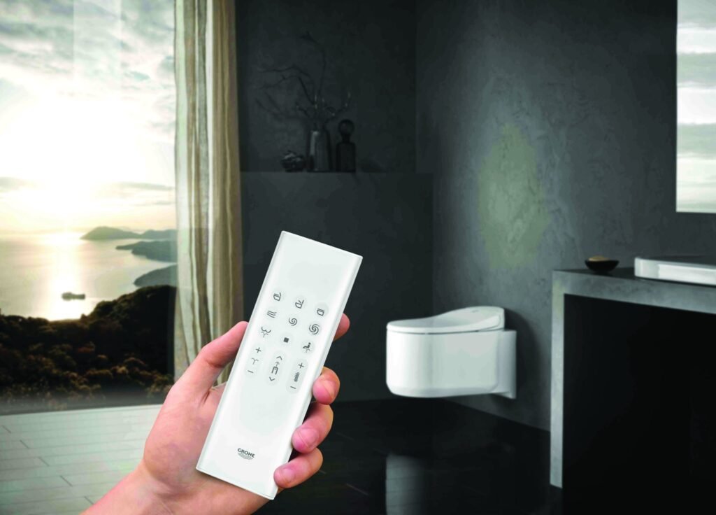 Smart toilet with remote control in modern bathroom showcasing advanced sanitaryware technology