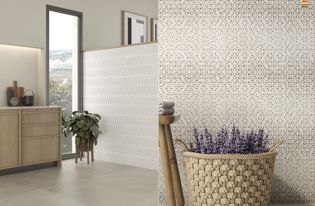 Subtle patterned wall cladding tiles enhancing a bright kitchen space with neutral tones and natural light.
