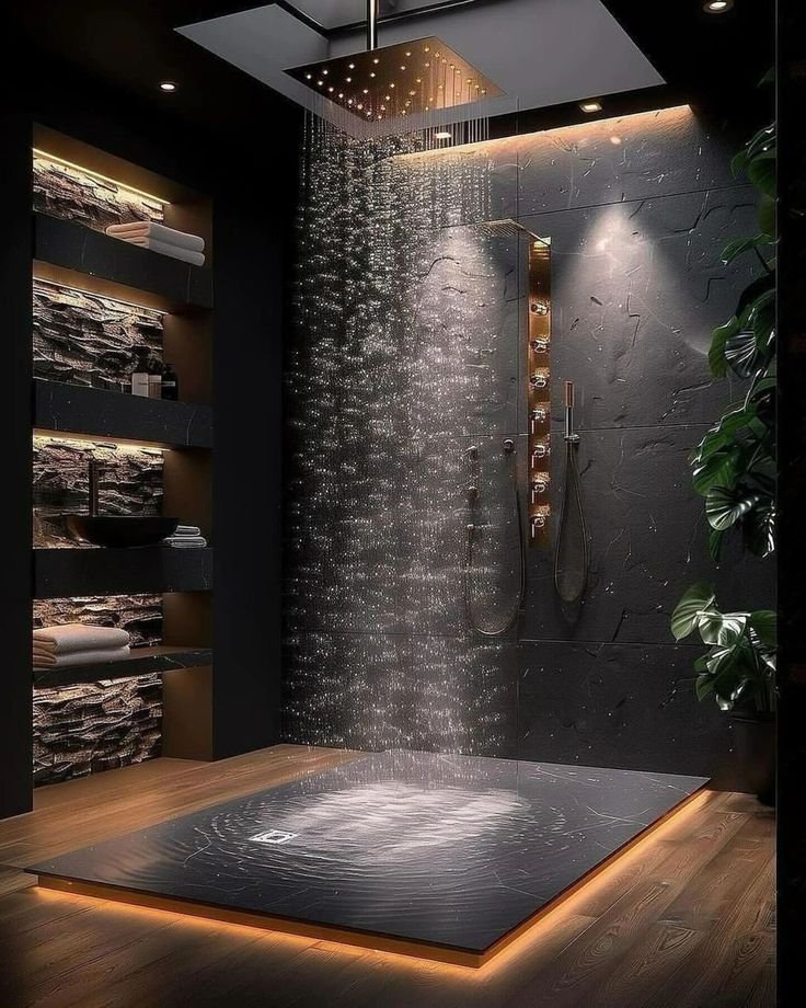 Modern rain shower area with dark tiles and luxury sanitaryware setup for premium bathing experience