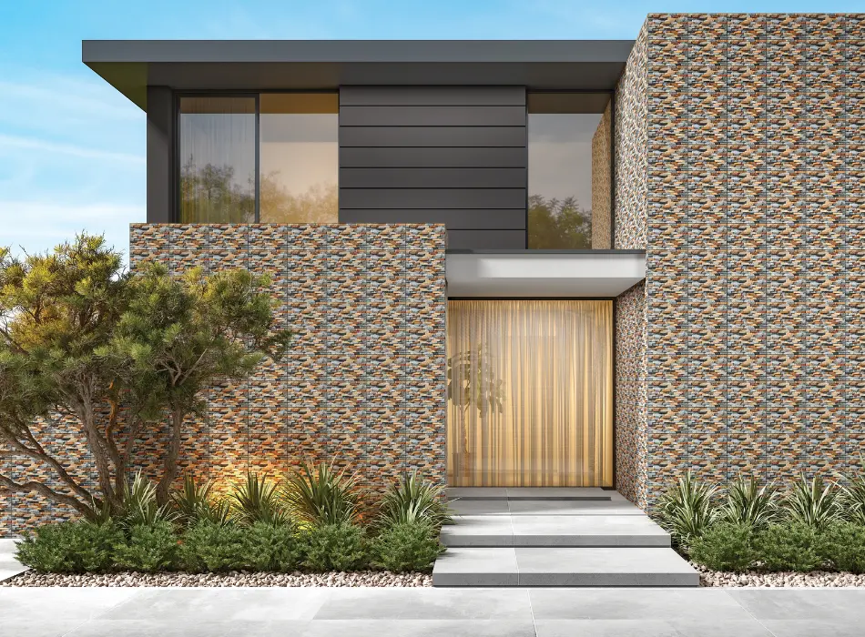 Modern luxury house exterior designed with premium textured outdoor wall cladding and balanced landscape elements.