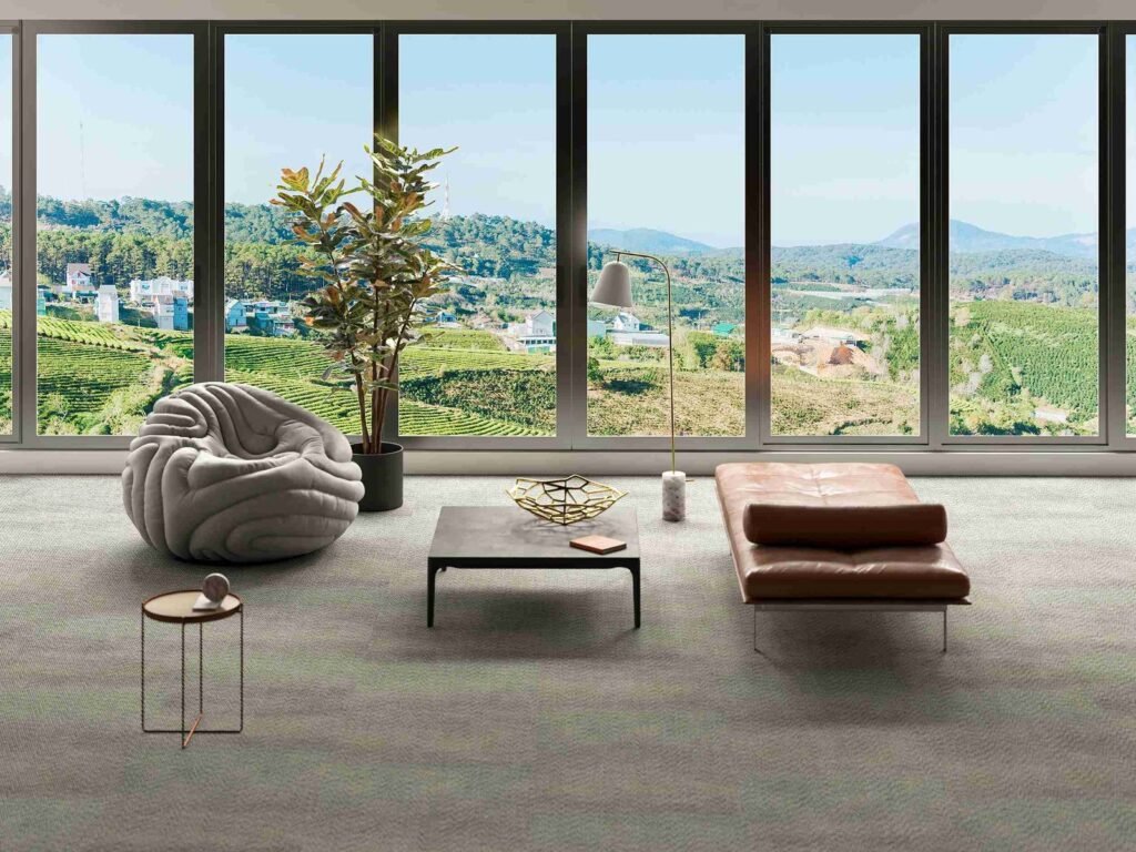 Panoramic aluminium doors and windows creating expansive natural views in a luxury living room
